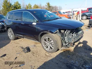 2021 Cadillac XT6 Premium Luxury with VIN 1GYKPFRS9MZ141298, listed as a IAAI auction lot 41304705 with 87,470 mi miles. Bid and sale history available at carsss.com. Image 1.