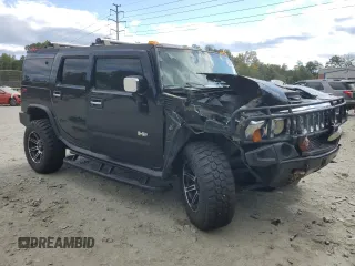 2003 Hummer H2 with VIN 5GRGN23U73H125110, listed as a Copart auction lot 75932244 with 0 mi miles and Salvage Title. Bid and sale history available at carsss.com. Image 4.