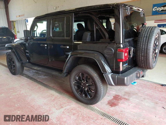 2023 Jeep Wrangler Sahara with VIN 1C4JJXP65PW627241, listed as a Copart auction lot 62873313 with 9,219 mi miles and Clean Title. Bid and sale history available at DreamBid. Image 2.