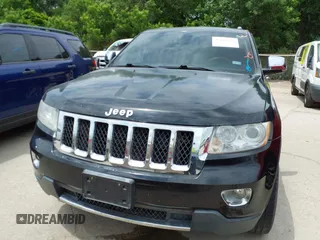 2013 Jeep Grand Cherokee Overland with VIN 1C4RJECT2DC588124, listed as a IAAI auction lot 42142573 with 204,309 mi miles and . Bid and sale history available at DreamBid. Image 6.
