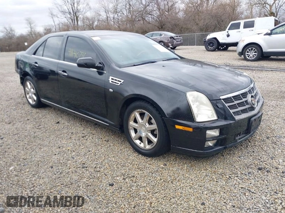 2011 Cadillac STS RWD z VIN 1G6DW6ED8B0159384, wystawiony jako IAAI lot #41840796 z przebiegiem 209 953 mil mil oraz . Historia ofert i sprzedaży dostępna na DreamBid. Obrazek 1.