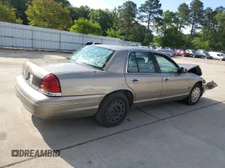 2003 Ford Police Interceptor Street Appear with VIN 2FAFP71W73X148322, listed as a Copart auction lot 55573035 with 268,812 mi miles and Salvage title. Bid and sale history available at DreamBid. Image 3.