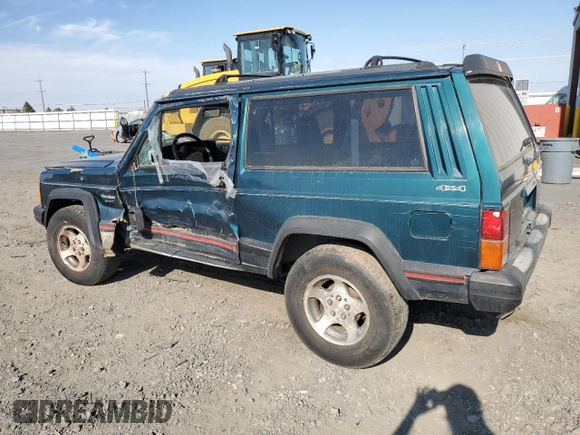 1995 Jeep Cherokee Sport with VIN 1J4FJ67S4SL519629, listed as a Copart auction lot 76107844 with 312,532 mi miles and Salvage Title. Bid and sale history available at carsss.com. Image 2.