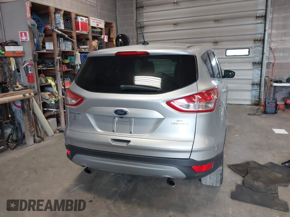 2015 Ford Escape SE with VIN 1FMCU0GX4FUC22042, listed as a IAAI auction lot 42094798 with 35,407 mi miles and . Bid and sale history available at DreamBid. Image 17.