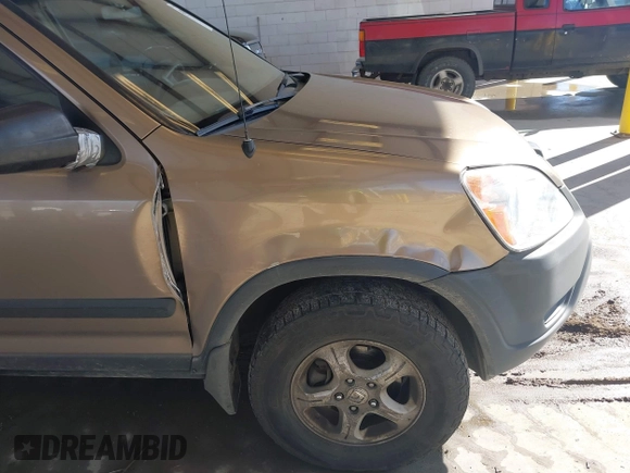 2002 Honda CR-V LX z VIN JHLRD78512C007757, wystawiony jako IAAI lot #41885302 z przebiegiem 177 892 mil mil oraz . Historia ofert i sprzedaży dostępna na DreamBid. Obrazek 6.