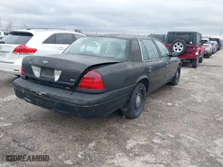 2011 Ford Crown Victoria with VIN 2FABP7AV4BX166216, listed as a IAAI auction lot 41268754 with 205,308 mi miles. Bid and sale history available at carsss.com. Image 4.