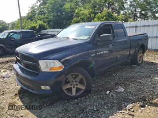2012 Ram 1500 ST with VIN 1C6RD7FTXCS209087, listed as a Copart auction lot 64202305 with 245,944 mi miles and Salvage title. Bid and sale history available at DreamBid. Image 1.
