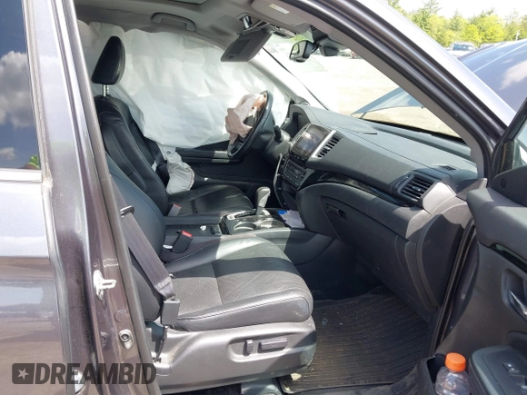 2017 Honda Ridgeline RTL-E with VIN 5FPYK3F77HB003274, listed as a IAAI auction lot 42268854 with 71,049 mi miles and . Bid and sale history available at DreamBid. Image 5.