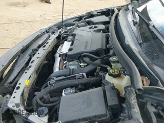 2018 Chevrolet Cruze LT z VIN 1G1BE5SMXJ7191371, wystawiony jako IAAI lot #43055956 z przebiegiem 104 565 mil mil oraz . Historia ofert i sprzedaży dostępna na DreamBid. Obrazek 21.