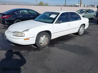 1997 Chevrolet Lumina with VIN 2G1WL52M4V9123059, listed as a IAAI auction lot 42058465 with 192,168 mi miles. Bid and sale history available at carsss.com. Image 2.