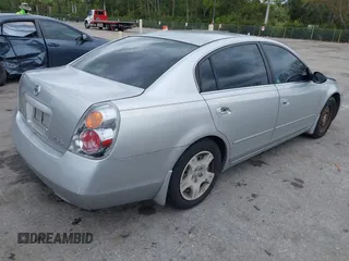 2004 Nissan Altima S with VIN 1N4AL11D04C130857, listed as a IAAI auction lot 41661519 with 147,518 mi miles. Bid and sale history available at carsss.com. Image 4.