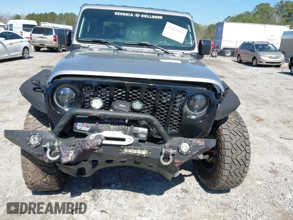 2021 Jeep Gladiator Freedom with VIN 1C6HJTAG3ML540967, listed as a IAAI auction lot 41883858 with 92,287 mi miles and . Bid and sale history available at DreamBid. Image 12.