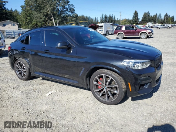 2021 BMW X4 M40i с VIN 5UX2V5C01M9F24036, выставлен на аукционе Copart как лот 74834364 с пробегом 38 185 миль миль и Списание • Salvage title. История ставок и продаж доступна на DreamBid. Изображение 4.