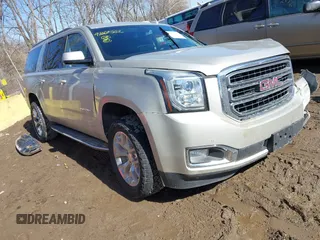 2016 GMC Yukon XL SLE with VIN 1GKS2FKC9GR458451, listed as a IAAI auction lot 41664562 with 196,400 mi miles. Bid and sale history available at carsss.com. Image 1.