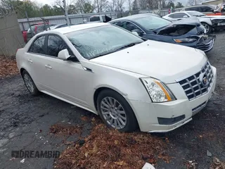 2012 Cadillac CTS Luxury with VIN 1G6DE5E57C0131342, listed as a IAAI auction lot 41872713 with 151,727 mi miles and . Bid and sale history available at DreamBid. Image 1.
