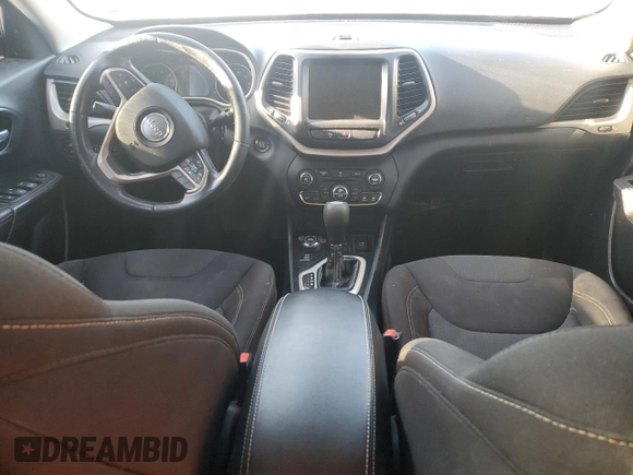 2016 Jeep Cherokee Altitude with VIN 1C4PJMCB3GW226203, listed as a Copart auction lot 83004294 with Not provided miles and Salvage title. Bid and sale history available at DreamBid. Image 8.
