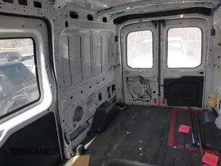 2015 Ford Transit Cargo with VIN 1FTNE2CMXFKA06516, listed as a IAAI auction lot 41650498 with 281,654 mi miles and . Bid and sale history available at carsss.com. Image 19.