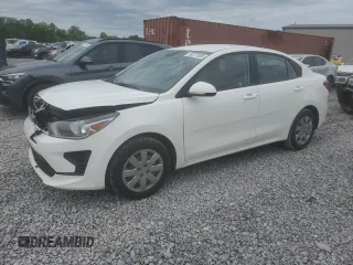 2023 Kia Rio S z VIN 3KPA24AD5PE616348, wystawiony jako Copart lot #54373985 z przebiegiem 51 275 mil mil oraz Szkody całkowita. Historia ofert i sprzedaży dostępna na DreamBid. Obrazek 1.