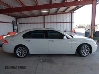 2007 BMW 7 Series 750Li z VIN WBAHN835X7DT74304, wystawiony jako IAAI lot #42594751 z przebiegiem 139 021 mil mil oraz . Historia ofert i sprzedaży dostępna na DreamBid. Obrazek 13.
