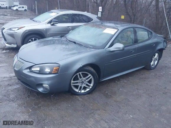 2004 Pontiac Grand Prix GTP with VIN 2G2WR524941347497, listed as a IAAI auction lot 41469548 with 255,783 mi miles. Bid and sale history available at carsss.com. Image 2.