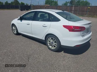 2015 Ford Focus SE z VIN 1FADP3F28FL334359, wystawiony jako IAAI lot #42520827 z przebiegiem 182 755 mil mil oraz . Historia ofert i sprzedaży dostępna na DreamBid. Obrazek 3.