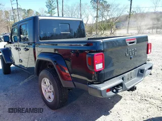 2023 Jeep Gladiator Sport S z VIN 1C6HJTAG8PL528821, wystawiony jako IAAI lot #41777653 z przebiegiem 65 656 mil mil oraz . Historia ofert i sprzedaży dostępna na DreamBid. Obrazek 3.