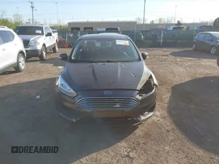 2016 Ford Focus SE with VIN 1FADP3F2XGL207906, listed as a IAAI auction lot 42099203 with 95,527 mi miles. Bid and sale history available at carsss.com. Image 12.