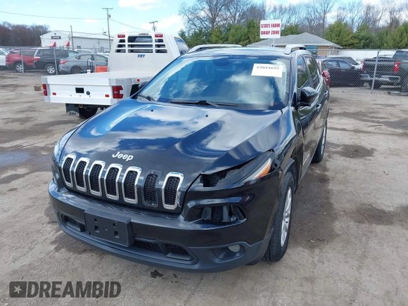 2014 Jeep Cherokee Latitude with VIN 1C4PJMCS6EW219999, listed as a IAAI auction lot 42044695 with 169,533 mi miles and . Bid and sale history available at carsss.com. Image 18.