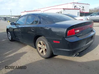 2014 Dodge Charger SE with VIN 2C3CDXBG9EH287009, listed as a IAAI auction lot 41924116 with 190,725 mi miles and . Bid and sale history available at carsss.com. Image 3.