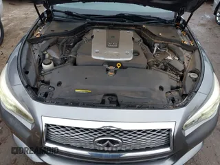 2014 Infiniti Q50 Premium with VIN JN1BV7AP4EM676498, listed as a IAAI auction lot 41900566 with 111,897 mi miles. Bid and sale history available at carsss.com. Image 10.