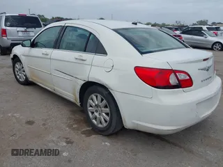 2008 Chrysler Sebring LX with VIN 1C3LC46K78N211784, listed as a IAAI auction lot 41966093 with 147,753 mi miles and . Bid and sale history available at DreamBid. Image 3.