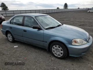 1999 Honda Civic LX with VIN 1HGEJ6577XL039447, listed as a Copart auction lot 55970854 with 100,776 mi miles and Salvage Title. Bid and sale history available at carsss.com. Image 4.