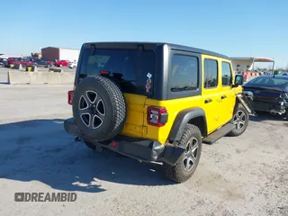 2021 Jeep Wrangler Unlimited Willys with VIN 1C4HJXDG4MW532399, listed as a IAAI auction lot 41833236 with 64,627 mi miles and . Bid and sale history available at DreamBid. Image 4.
