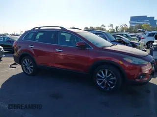 2014 Mazda CX-9 Grand Touring with VIN JM3TB3DV6E0435389, listed as a IAAI auction lot 41406200 with 181,598 mi miles and . Bid and sale history available at DreamBid. Image 13.