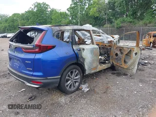 2021 Honda CR-V Touring with VIN 7FARW2H98ME008086, listed as a IAAI auction lot 42411519 with Not provided miles and . Bid and sale history available at DreamBid. Image 4.