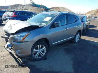 2015 Nissan Rogue S with VIN JN8AS5MVXFW770931, listed as a IAAI auction lot 41575344 with 160,556 mi miles and . Bid and sale history available at DreamBid. Image 16.