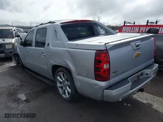 2013 Chevrolet Avalanche LTZ with VIN 3GNTKGE73DG306592, listed as a IAAI auction lot 41695072 with 243,700 mi miles. Bid and sale history available at carsss.com. Image 3.