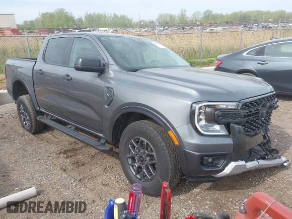 2024 Ford Ranger XLT z VIN 1FTER4HH6RLE34724, wystawiony jako IAAI lot #42256858 z przebiegiem 12 438 mil mil oraz . Historia ofert i sprzedaży dostępna na DreamBid. Obrazek 1.