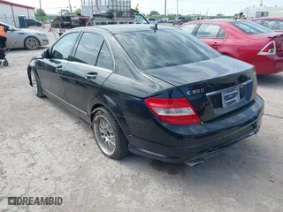 2009 Mercedes-Benz C-Class 3.0L Sport with VIN WDDGF81X59R057137, listed as a IAAI auction lot 41929478 with 157,153 mi miles. Bid and sale history available at carsss.com. Image 3.
