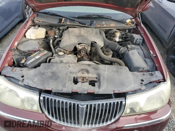 2001 Lincoln Town Car Cartier z VIN 1LNHM83WX1Y732737, wystawiony jako Copart lot #48216445 z przebiegiem 103 262 mil mil oraz Szkoda całkowita • Salvage title. Historia ofert i sprzedaży dostępna na DreamBid. Obrazek 11.
