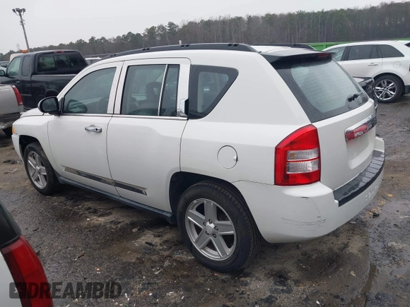 2007 Jeep Compass Sport with VIN 1J8FT47W27D256252, listed as a IAAI auction lot 41616554 with 210,125 mi miles. Bid and sale history available at carsss.com. Image 3.