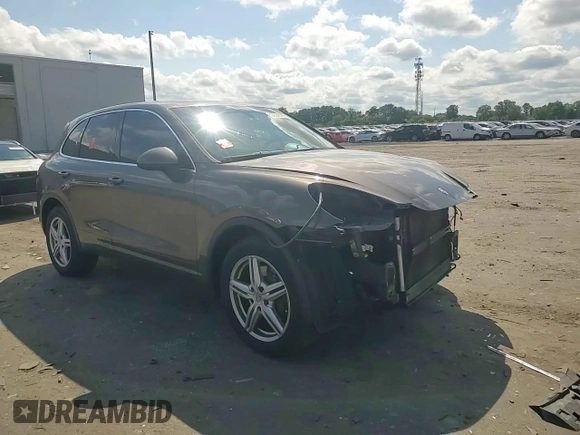 2011 Porsche Cayenne with VIN WP1AA2A28BLA04200, listed as a Copart auction lot 56824575 with 180,123 mi miles and Salvage title. Bid and sale history available at DreamBid. Image 14.