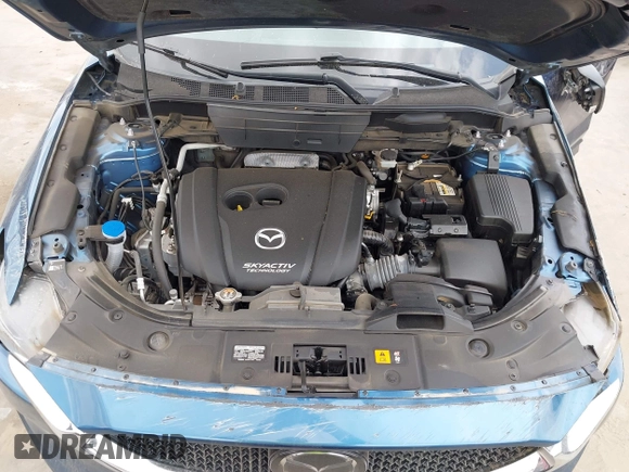 2018 Mazda CX-5 Touring z VIN JM3KFACM5J1442416, wystawiony jako IAAI lot #42093137 z przebiegiem 65 102 mil mil oraz . Historia ofert i sprzedaży dostępna na DreamBid. Obrazek 10.