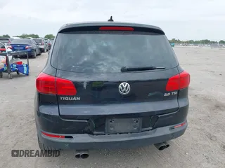 2014 Volkswagen Tiguan SE z VIN WVGAV3AXXEW535128, wystawiony jako IAAI lot #41882213 z przebiegiem 103 161 mil mil oraz . Historia ofert i sprzedaży dostępna na DreamBid. Obrazek 16.