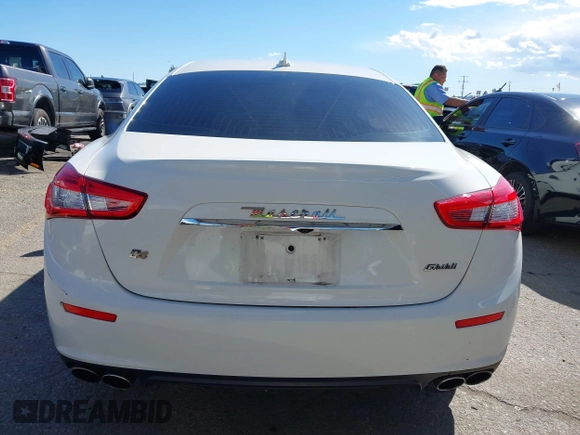 2015 Maserati Ghibli z VIN ZAM57XSA8F1161212, wystawiony jako IAAI lot #41746084 z przebiegiem 57 169 mil mil oraz . Historia ofert i sprzedaży dostępna na DreamBid. Obrazek 16.