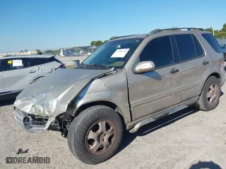 2003 Mercedes-Benz M-Class 3.7L with VIN 4JGAB57E23A453057, listed as a IAAI auction lot 41704721 with 190,649 mi miles. Bid and sale history available at carsss.com. Image 17.