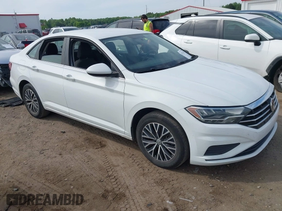 2021 Volkswagen Jetta S z VIN 3VWC57BU0MM021874, wystawiony jako IAAI lot #42124747 z przebiegiem 89 887 mil mil oraz . Historia ofert i sprzedaży dostępna na DreamBid. Obrazek 1.