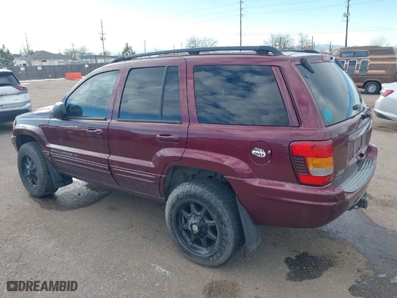 2002 Jeep Grand Cherokee Limited with VIN 1J8GW58N02C324540, listed as a IAAI auction lot 41476068 with 205,646 mi miles. Bid and sale history available at carsss.com. Image 3.