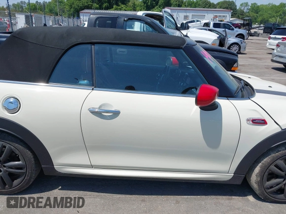 2021 MINI Convertible with VIN WMWWJ9C0XM3M07302, listed as a IAAI auction lot 42027854 with 30,921 mi miles and . Bid and sale history available at DreamBid. Image 13.