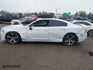 2013 Dodge Charger RT Plus with VIN 2C3CDXCT8DH660566, listed as a IAAI auction lot 40865076 with 113,417 mi miles. Bid and sale history available at carsss.com. Image 14.